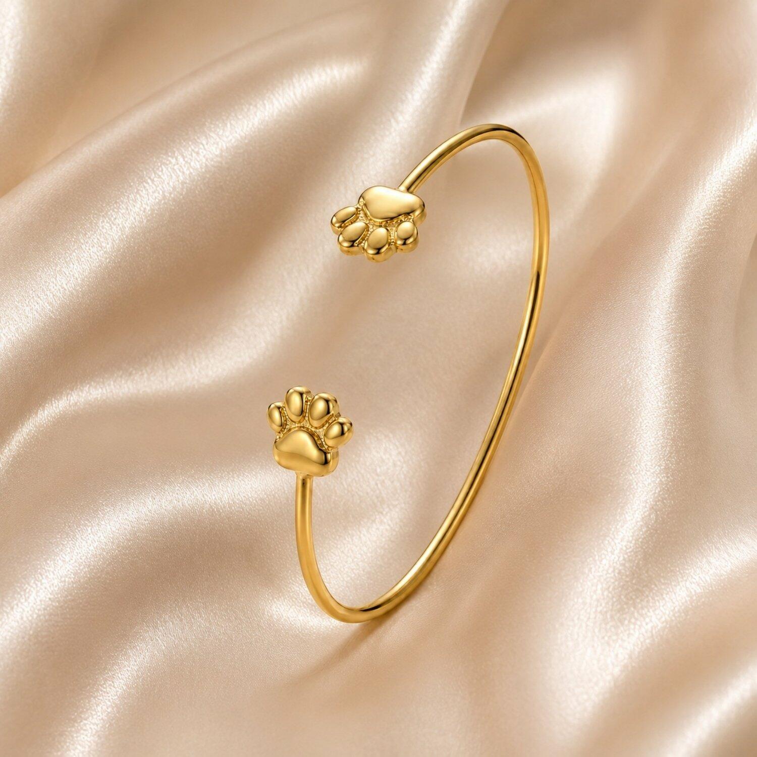 Bracelete Aberto 2 Patinha de Cachorro Abaulado Banhado em Ouro 18K
