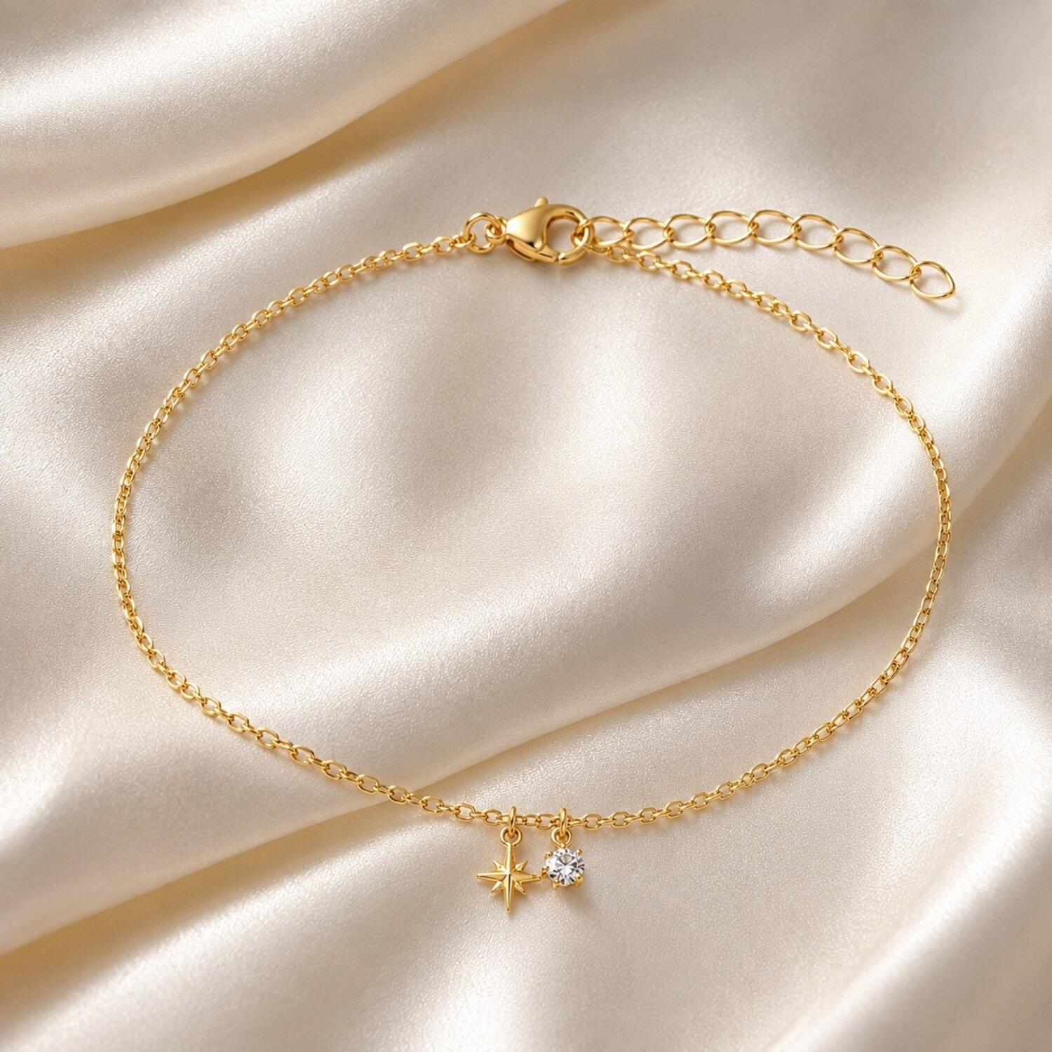 Tornozeleira Mini Elo Estrela Cadente com Ponto de Luz Banhado em Ouro 18K