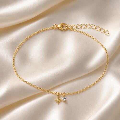 Tornozeleira Mini Elo Estrela Cadente com Ponto de Luz Banhado em Ouro 18K