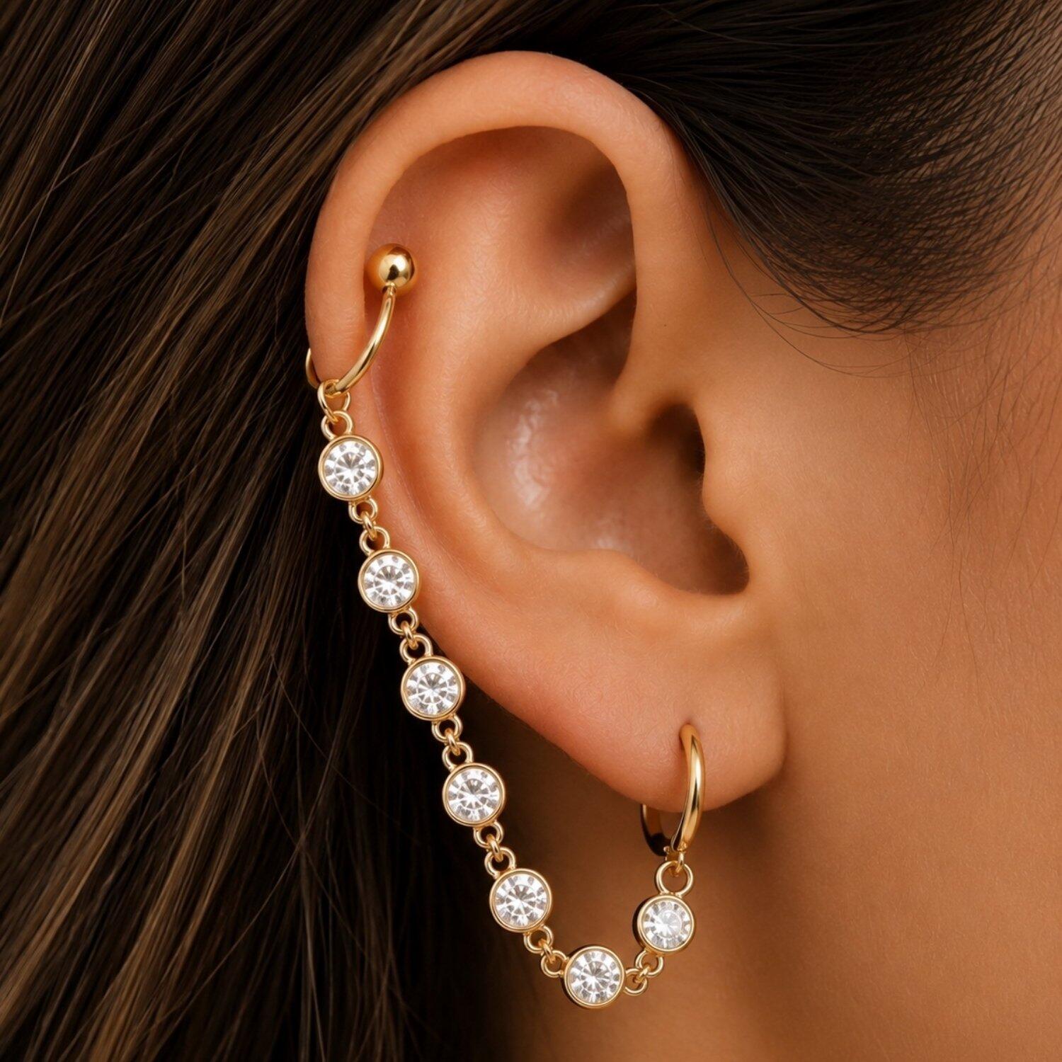 Brinco Ear Line Ponto de Luz com Piercing Fake Banhado a Ouro