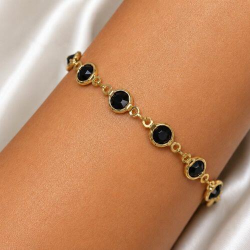 Pulseira Cristal Negra Redondo Banhado a Ouro