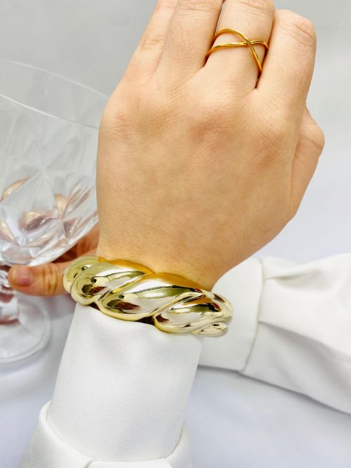 Bracelete Tran�ado Laminado Dourado