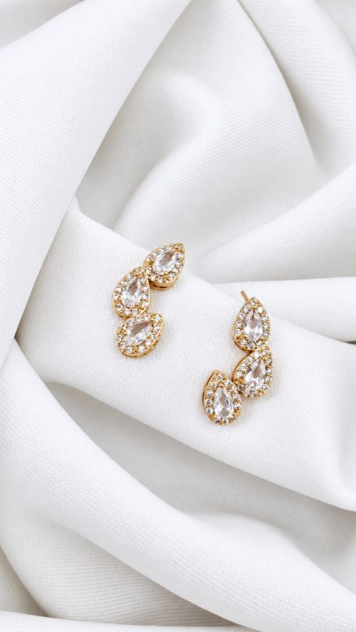 Brinco Tr�s Folhas Cristal Dourado