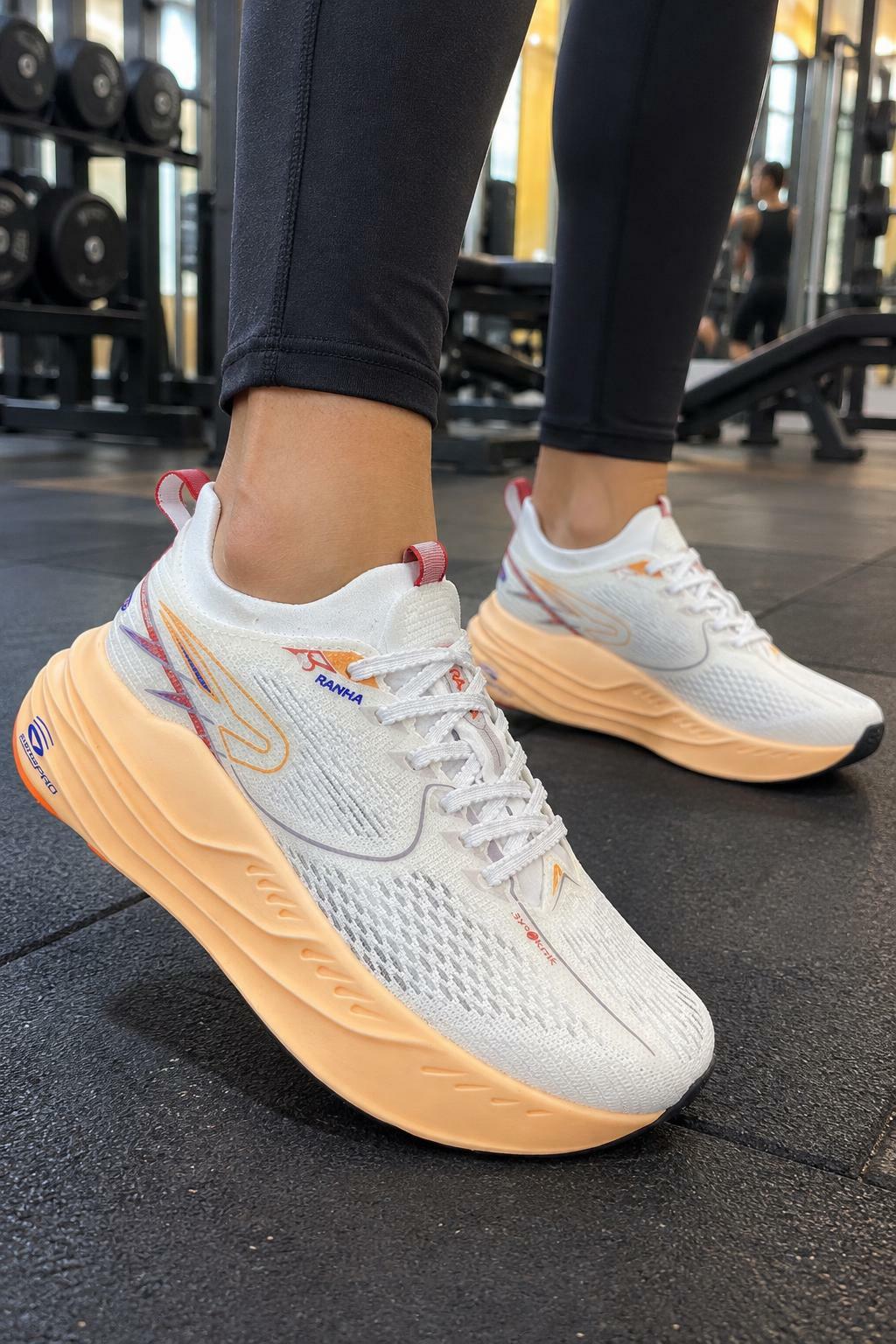 Tênis esportivo Rainha System Eclipse Pro - Branco/laranja